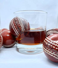Load image into Gallery viewer, Cricket whisky glass | unique 12oz mixer glass with embedded souvenir mini cricket ball | cricket gift | made in uk | cricket gifts for men
