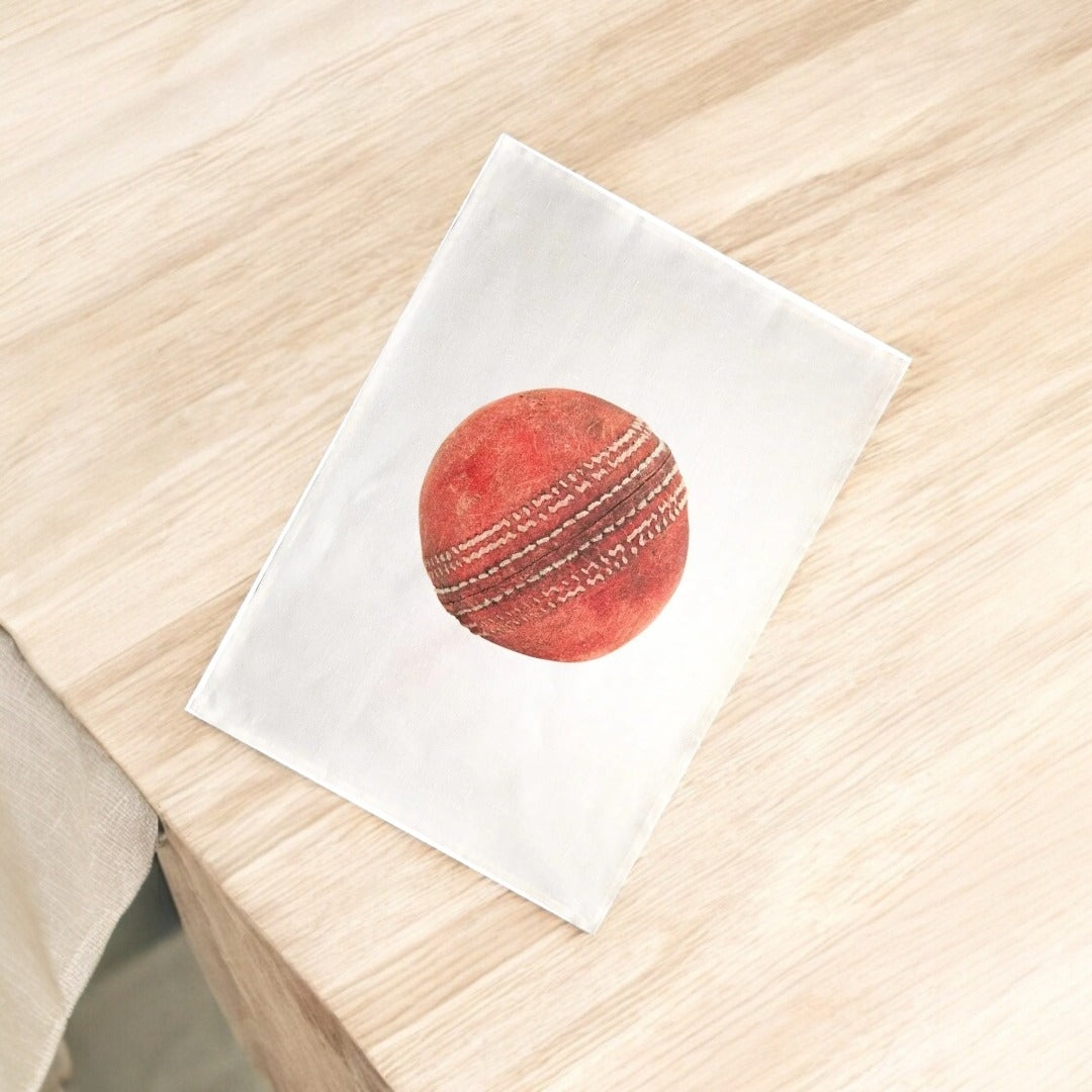 Cricket old ball tea towel